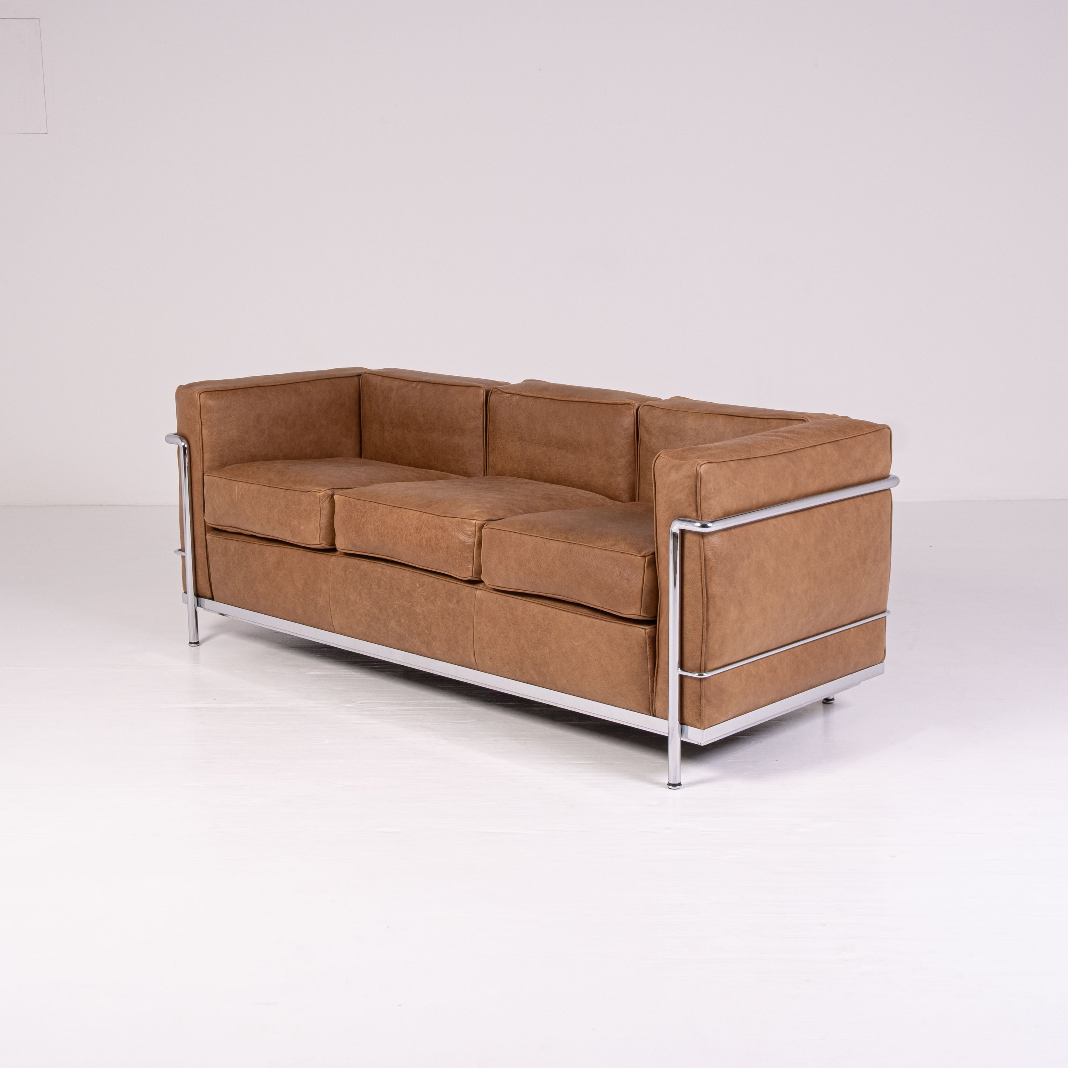LC2 three-seater sofa by Le Corbusier, Pierre Jeanneret, and Charlotte Perriand for Cassina