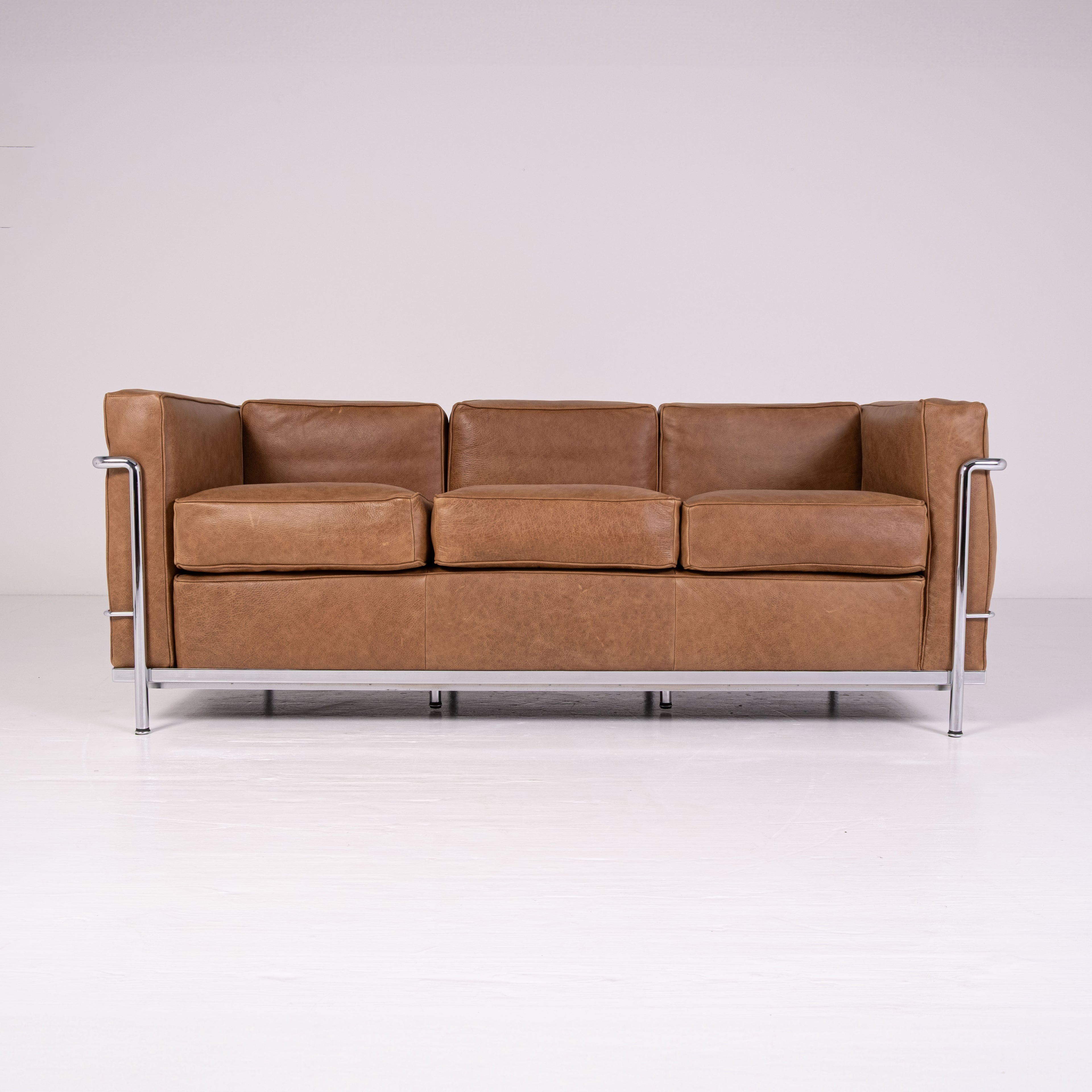 LC2 three-seater sofa by Le Corbusier, Pierre Jeanneret, and Charlotte Perriand for Cassina