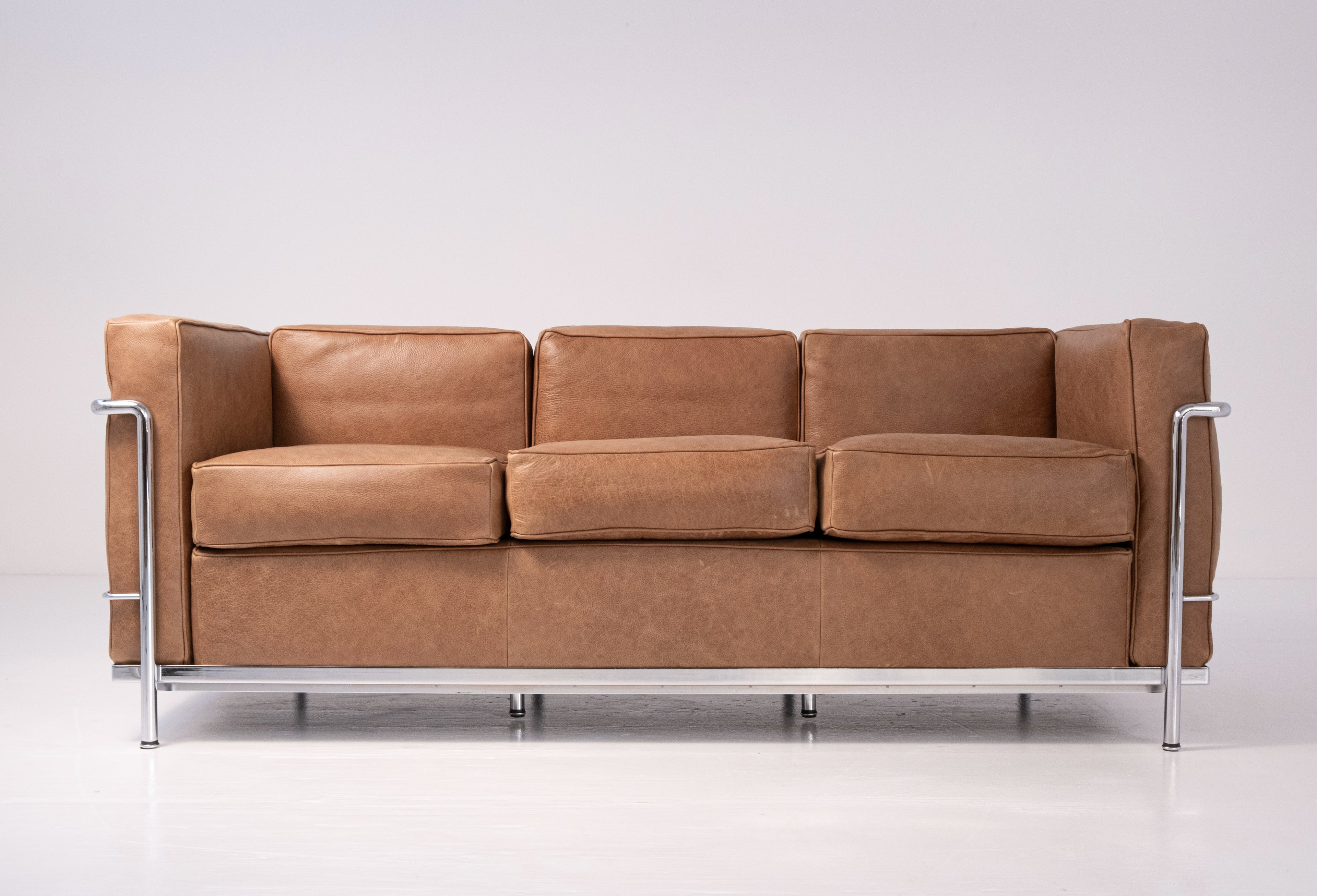 LC2 three-seater sofa by Le Corbusier, Pierre Jeanneret, and Charlotte Perriand for Cassina