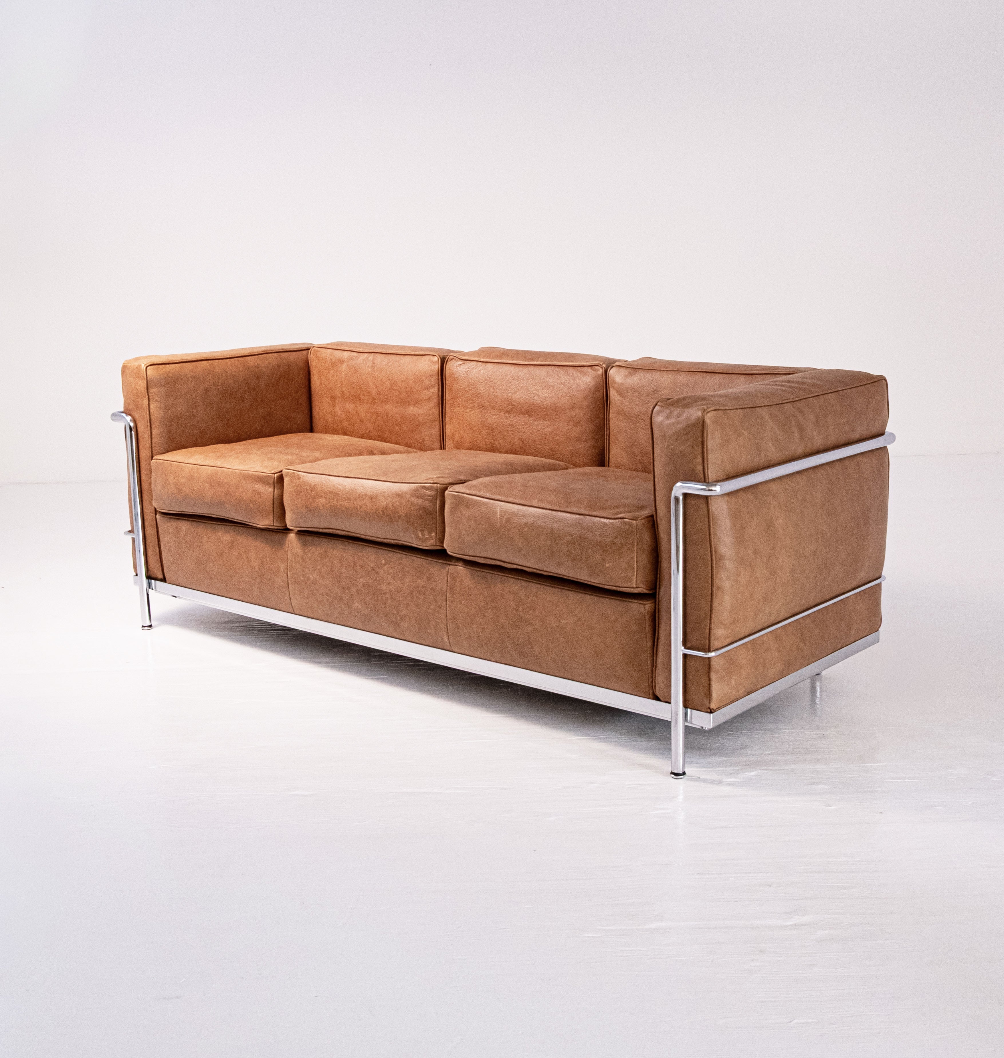 LC2 three-seater sofa by Le Corbusier, Pierre Jeanneret, and Charlotte Perriand for Cassina
