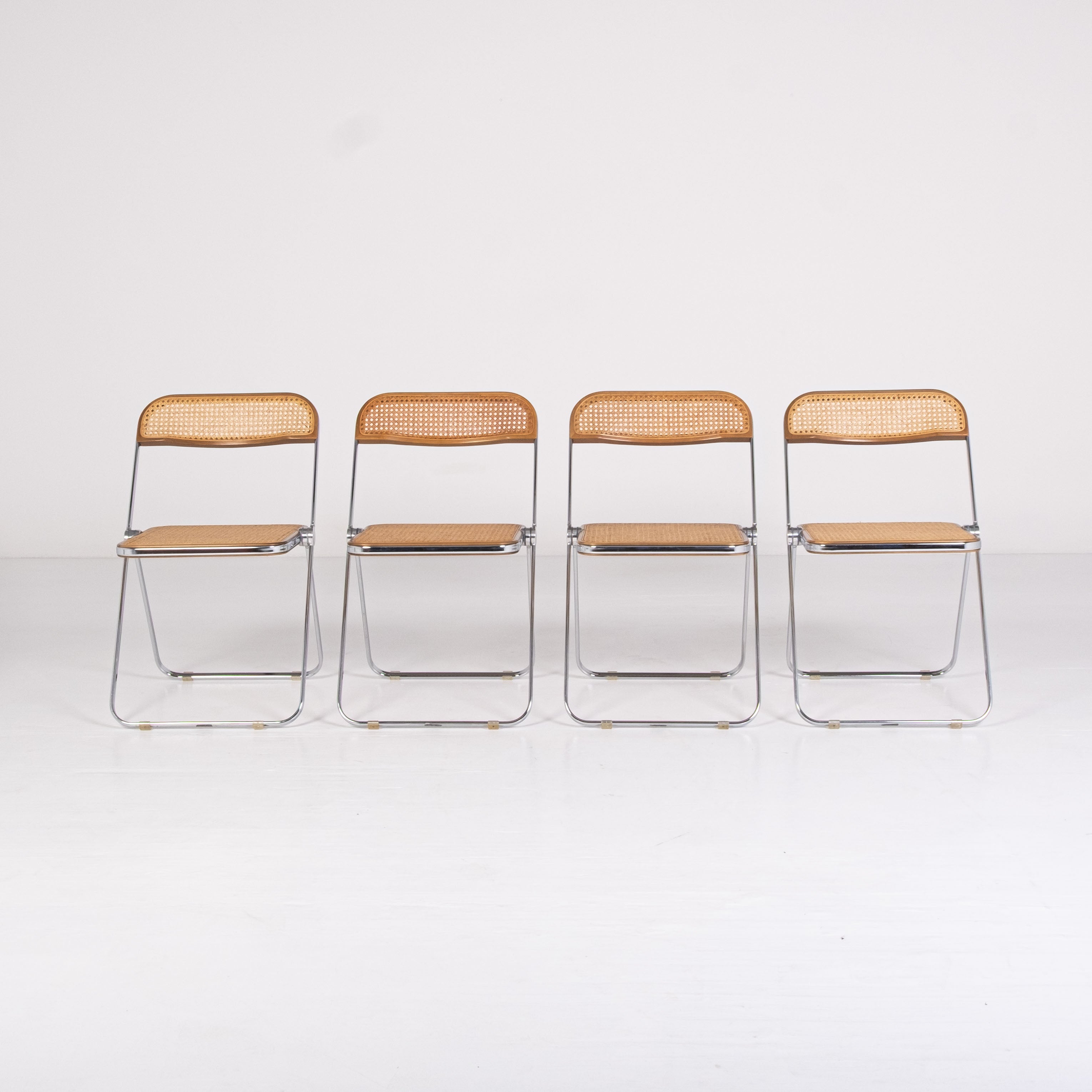 Set of 4 Plia Cané chairs – G. Piretti Anonima Castelli